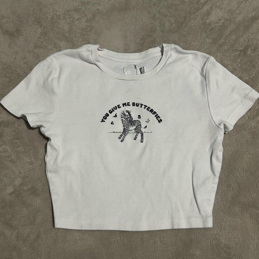 White Crop Tee with Zebra 'You Give Me Butterflies' Graphic